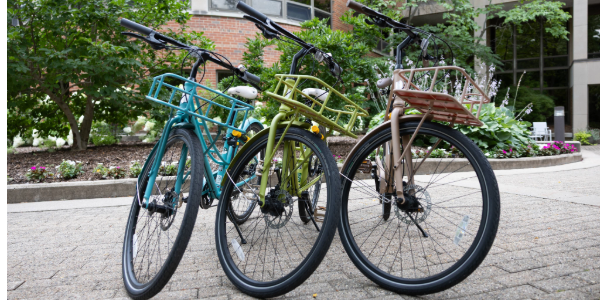 3 Bicycles, one blue, one green, one brown, at Kellogg Hotel & Conference Center